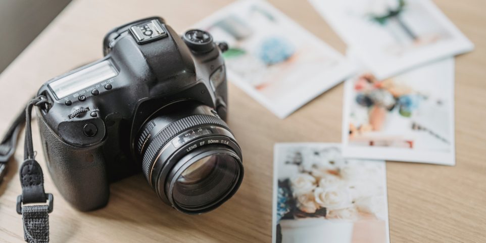 Photo camera with printed photos