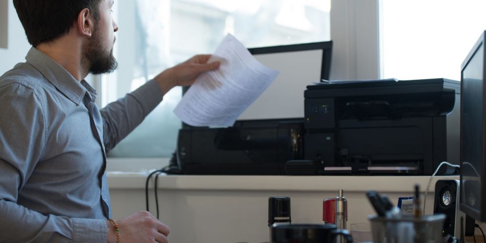 Businessman Scanning and Printing Document